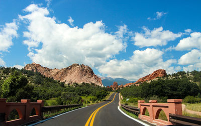 Empty road against sky