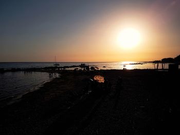 Silhouette of beach during sunset