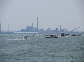 View of buildings in distance with waterfront