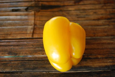 High angle view of yellow bell pepper on table
