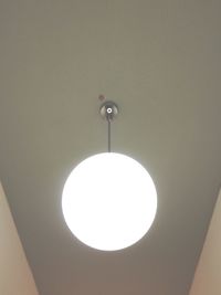 Low angle view of illuminated ceiling