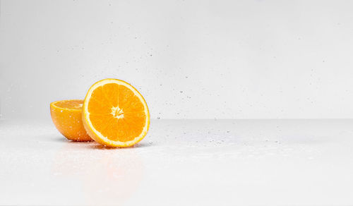 Close-up of drink against white background
