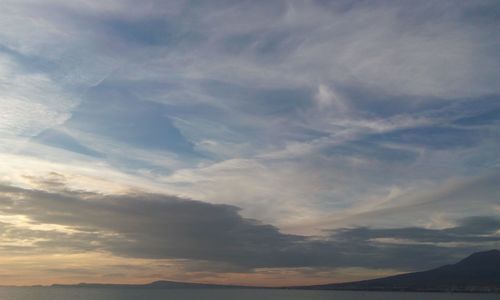 Low angle view of dramatic sky during sunset