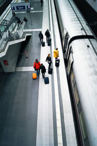 High angle view of passengers at railroad station platform