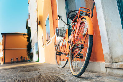 Bicycles parked on street in city