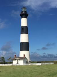 Lighthouse against blue sky