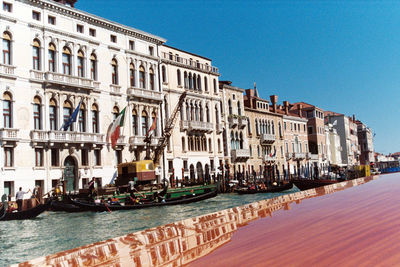 View of buildings against blue sky