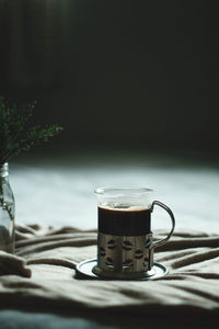 Close-up of coffee cup on table