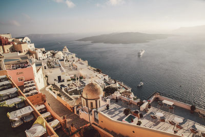 High angle view of cityscape by sea