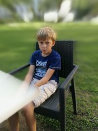 Boy playing on grass