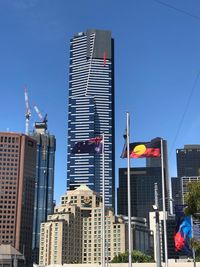 Low angle view of modern buildings against clear sky