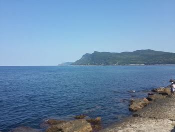 Scenic view of sea against clear sky