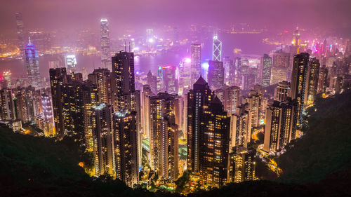 Aerial view of illuminated city at night