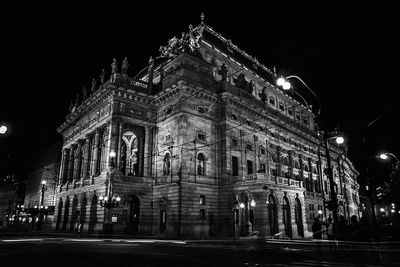 Low angle view of illuminated building at night