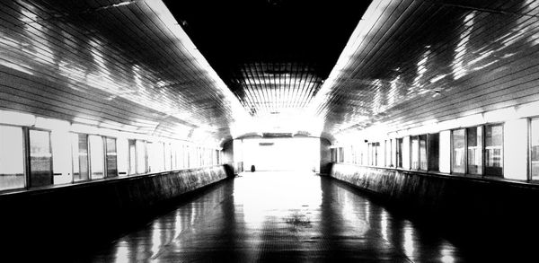 Illuminated corridor of building