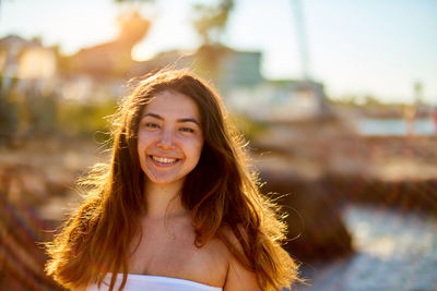 Close-up portrait of smiling beautiful woman