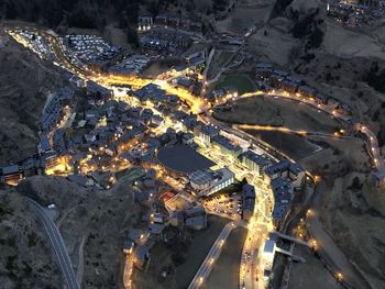 High angle view of illuminated city at night