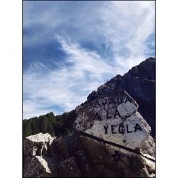 View of mountain range against cloudy sky