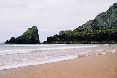 Scenic view of beach against sky