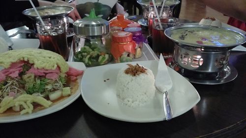 Close-up of food served on table