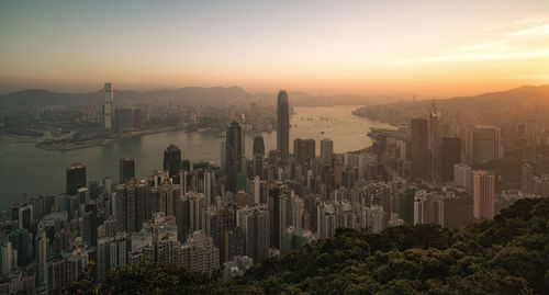 Aerial view of city at sunset