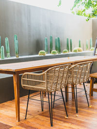Empty chairs and tables in restaurant