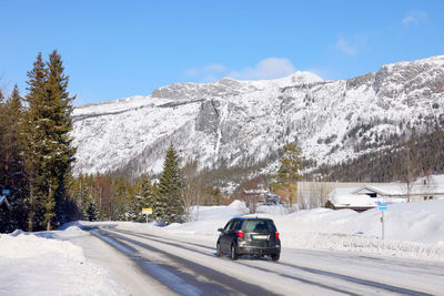 Snow covered mountain against sky