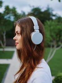 Portrait of young woman looking away