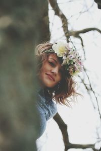 Portrait of woman wearing flowers