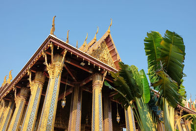 Low angle view of building against clear blue sky