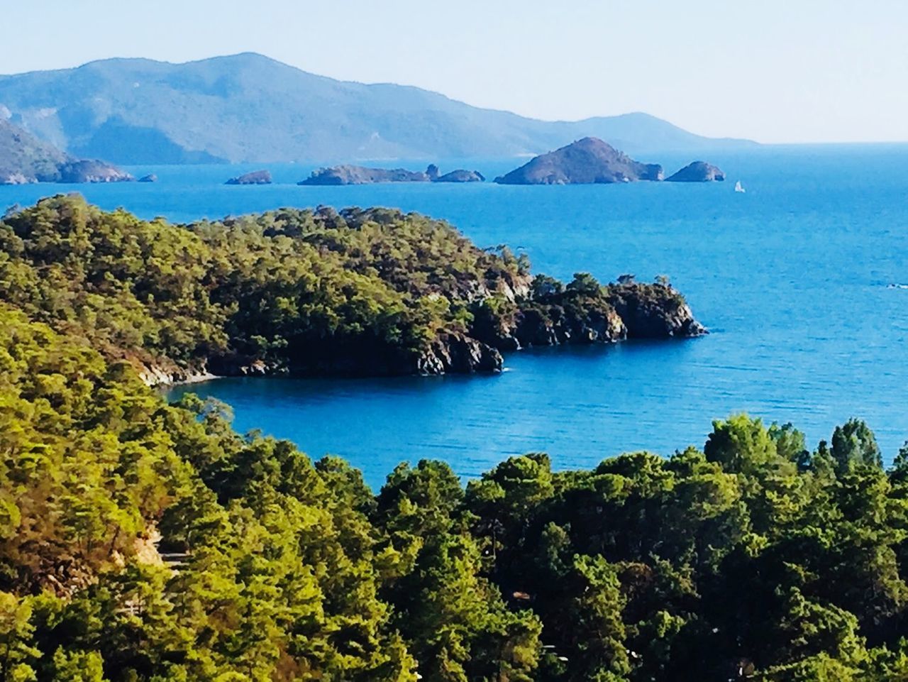 SCENIC VIEW OF SEA AND MOUNTAINS