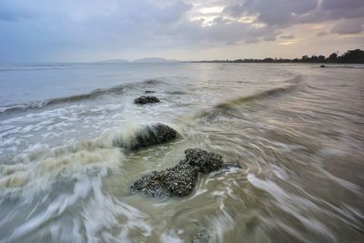 Scenic view of sea against sky during sunset