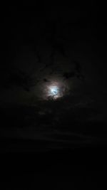 Low angle view of moon in sky at night