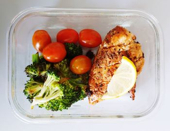 High angle view of vegetables in plate on table