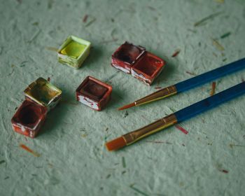 High angle view of various objects on table