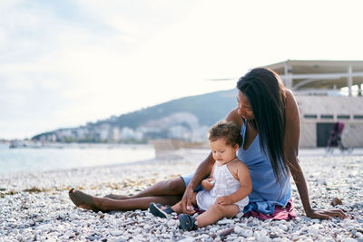 Mother and daughter on beach