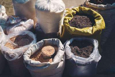 High angle view of various food grain for sale in market