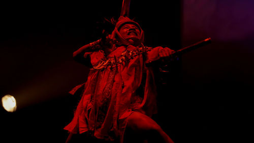 Indonesian, dayak traditional dancer dancing at the festival