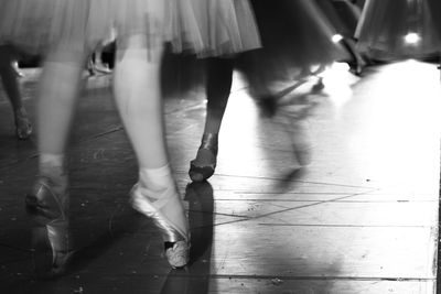 Legs of ballet dancers during show