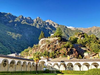 Scenic view of mountains against clear blue sky