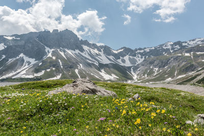 Scenic view of landscape and mountains against sky