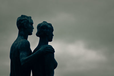 Low angle view of statue against sky