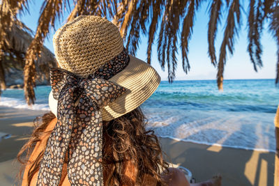 Woman relaxing at a beach.