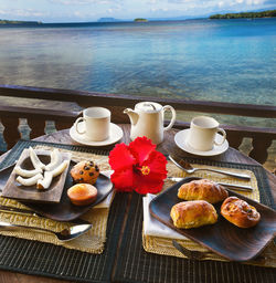 Breakfast on table by sea