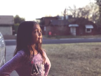 Young woman with eyes closed