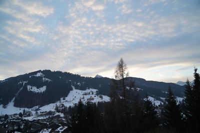 Scenic view of mountains against sky during winter