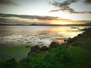 Scenic view of sea against sky during sunset