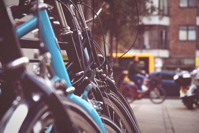 Close-up of bicycle on city street