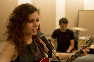 Young musicians practicing at a rehearsal space