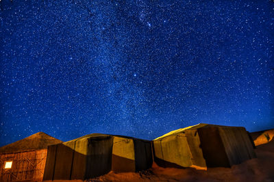 Low angle view of blue sky at night